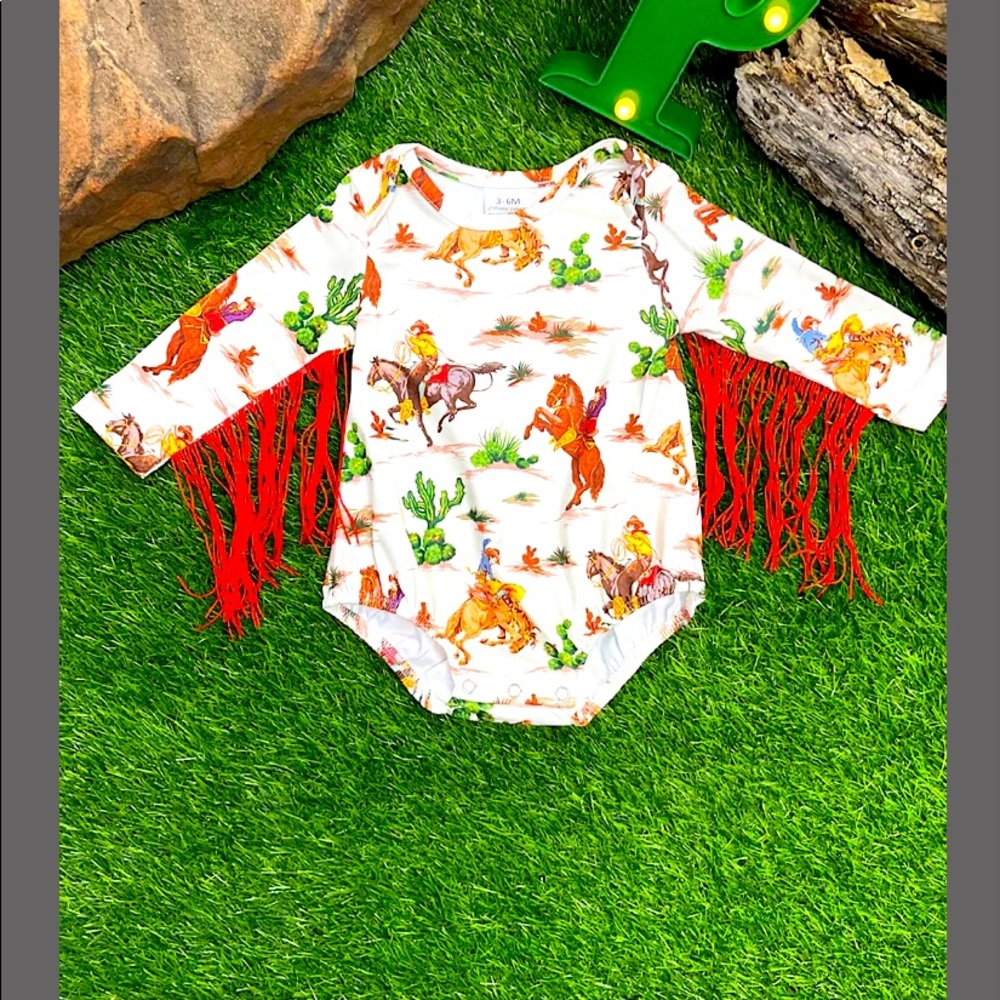 Baby’s tassel onesie